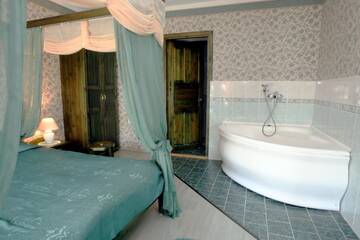 Фото номера Люкс с 1 спальней и сауной Мини-отель Katariina Guesthouse г. Раквере 2