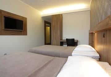 Фото номера Стандартный двухместный номер с 2 отдельными кроватями Отель Hotell Wesenbergh г. Раквере 5